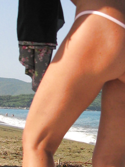 On a nudist beach